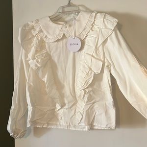 BOUTIQUE STORIA BRAND WHITE BLOUSE. SIZE MEDIUM.